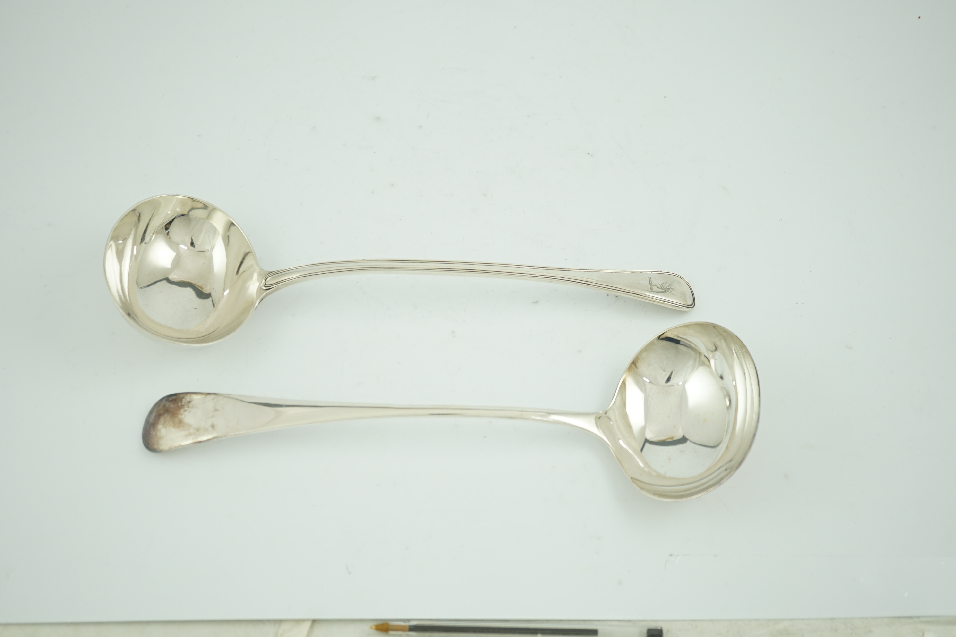 Two Edwardian silver soup ladles, Old English pattern, Walker & Hall, Sheffield, 1907 and Old English thread pattern, Holland, Aldwinckle & Slater, London, 1903